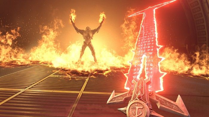 An Archvile raising its arms and conjuring fire in repsonse to the Doom slayer pulling out the energy sword called the Crucible