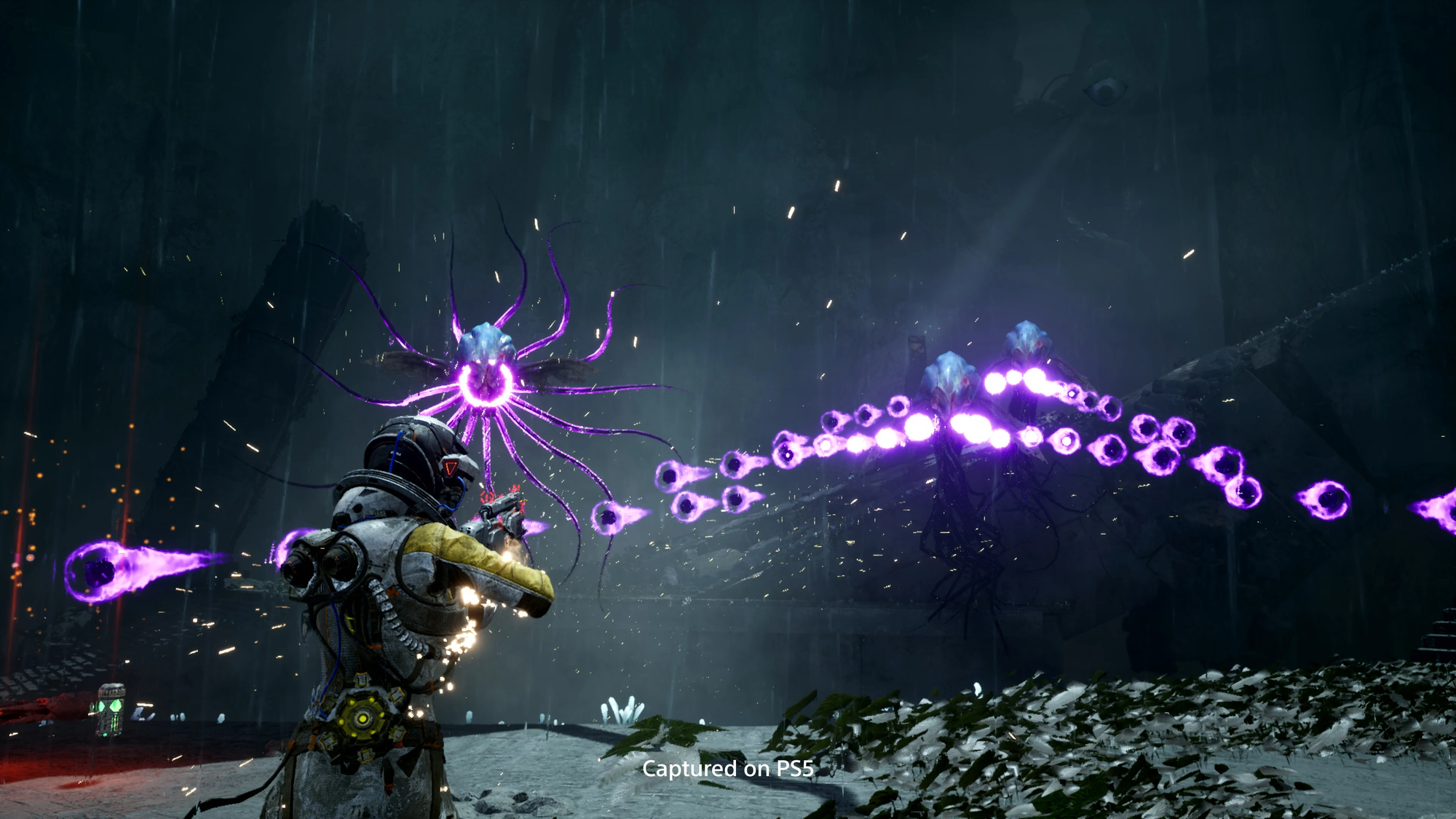 Gameplay of Selene fighitng off hostile life that is shooting a large amoint of purple projectiles.
